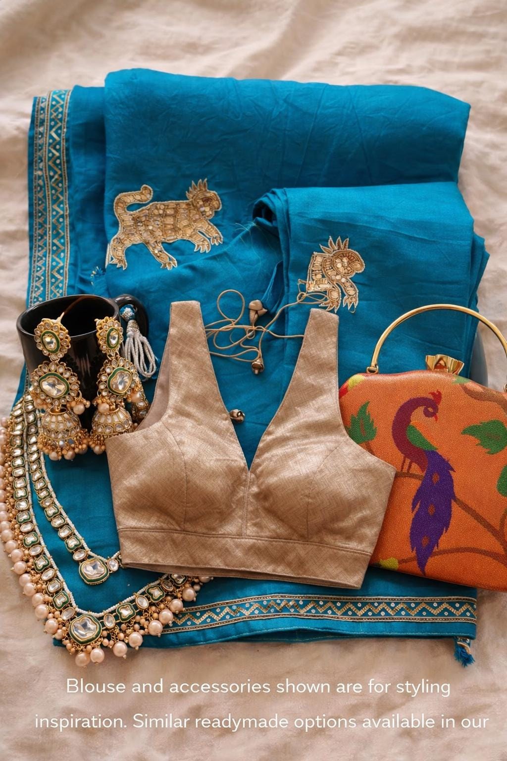 Teal Organza Silk Saree | Gold Tiger Motif, Zari Detailing (Ready to Wear)